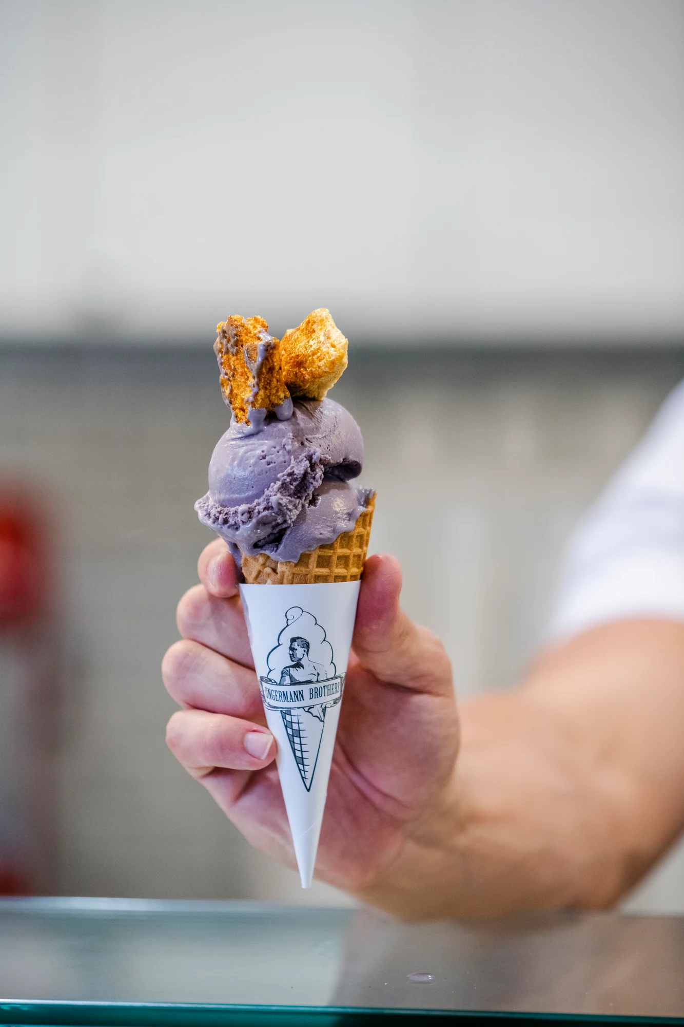 Lavender ice cream topped with golden honeycomb, made at Ungermann Brothers