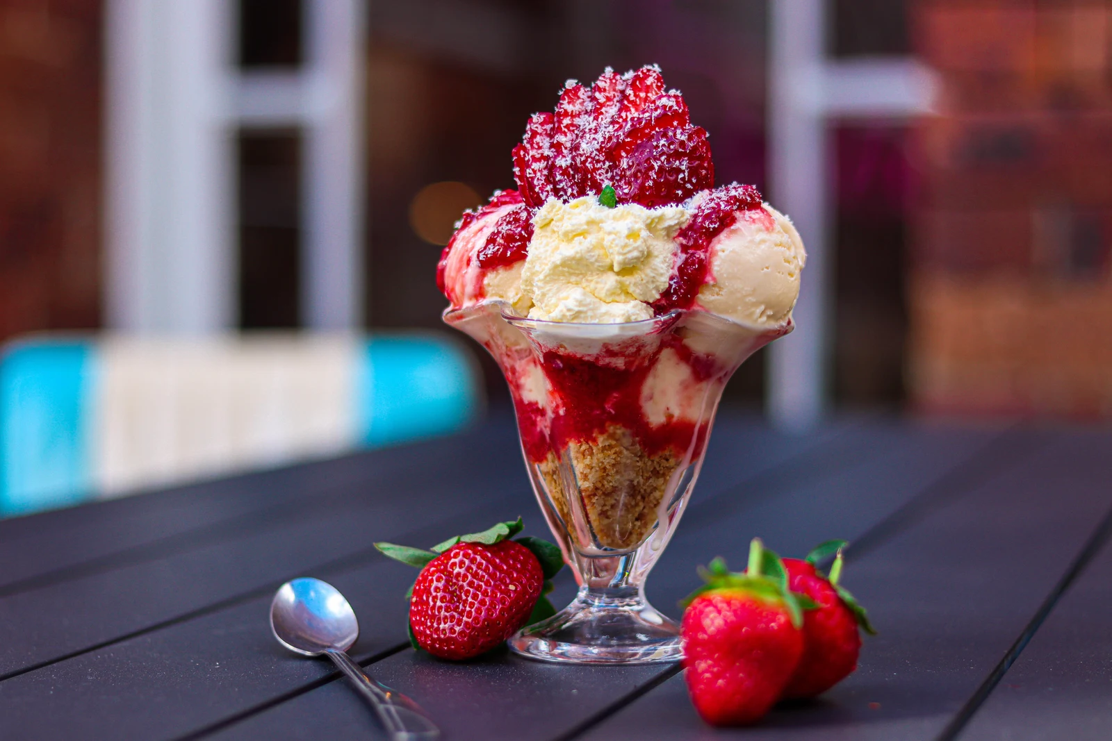 A strawberry sundae with house-made ice cream and fresh strawberries at UB’s